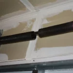 broken garage door spring