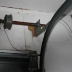 broken garage door wire