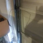 broken wire on garage door track