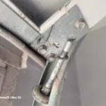 broken garage door rollers