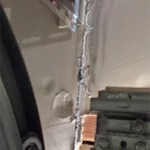 a garage door spring on the verge of braking